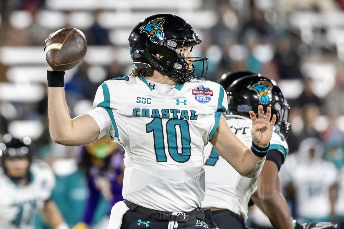 Coastal Carolina Chanticleers quarterback Grayson McCall (10) throws against the East Carolina Pirates in the 2022 Birmingham Bowl at Protective Stadium.