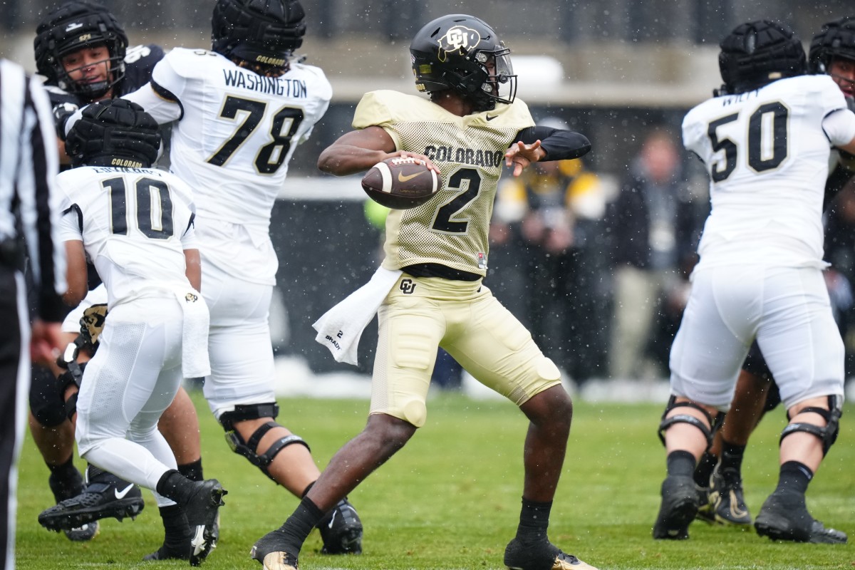 Colorado Buffaloes quarterback Shedeur Sanders (12) prepares to pass during the first half of the spring game at Folsom Filed.