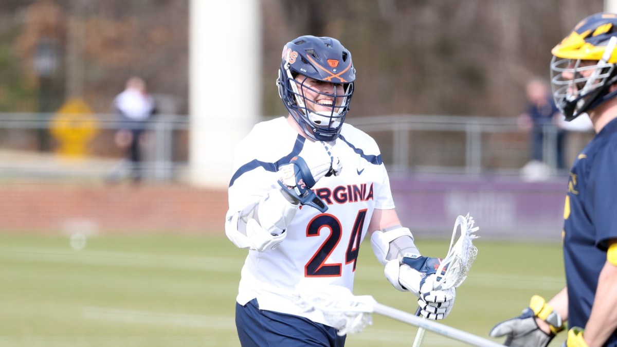 Payton Cormier celebrates after scoring a goal during the Virginia men's lacrosse game against Michigan at Klockner Stadium.