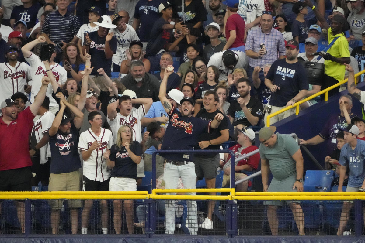 St. Petersburg, FL. USA; Tampa Bay Rays mascot D.J. Kitty entertains the  fans during a major league baseball game against the Seattle Mariners,  Monday, August 2, 2021, at Tropicana Field. The Mariners