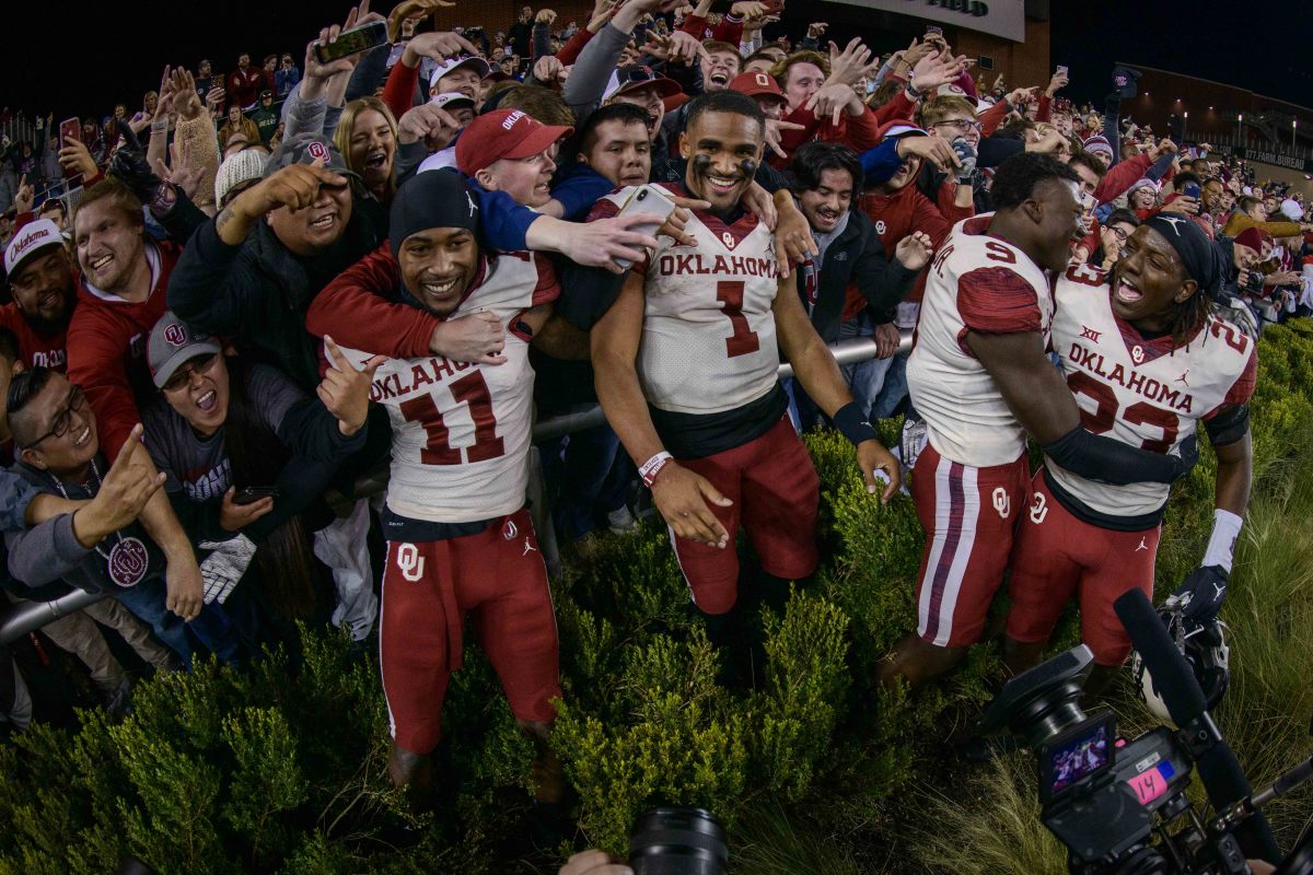 Jalen Hurts (1) and friends celebrate an impossible victory.