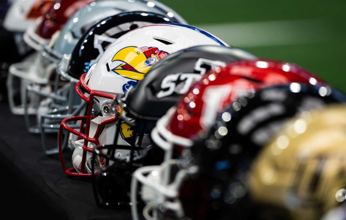 A football helmet from the University of Kansas on display during the first day of Big 12 Media Days in AT&T Stadium in Arlington, Texas, July 12, 2023.