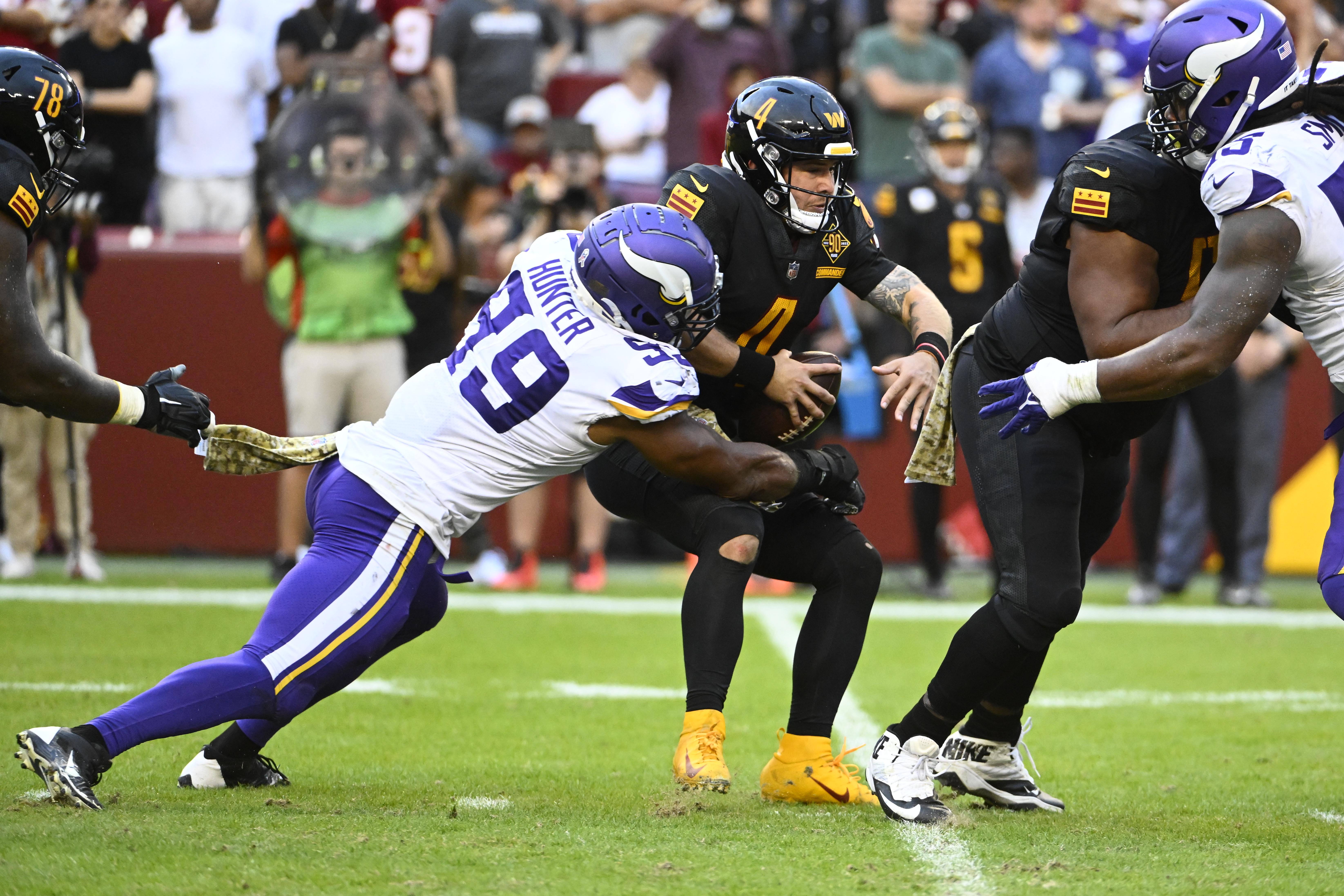 Minnesota Vikings guard Ezra Cleveland walks onto the field before the  team's preseason NFL football game against the Tennessee Titans, Saturday,  Aug. 19, 2023, in Minneapolis. (AP Photo/Bruce Kluckhohn Stock Photo - Alamy