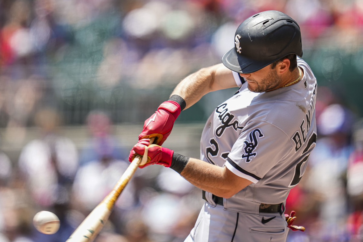 Jul 16, 2023; Cumberland, Georgia, USA; Chicago White Sox left fielder Andrew Benintendi (23) singles against the Atlanta Braves during the second inning at Truist Park.