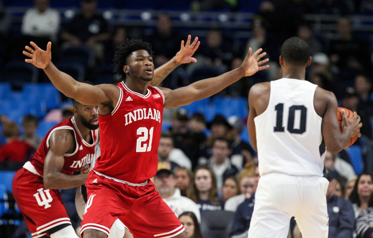 Indiana Hoosiers forward Freddie McSwain Jr (21) defends Penn State Nittany Lions guard Tony Carr (10) during the second half at Bryce Jordan Center. Indiana defeated Penn State 78-75.