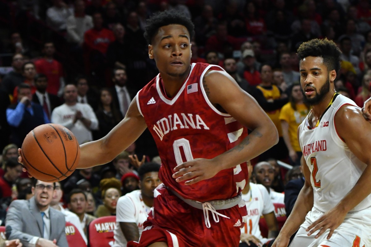 Indiana Hoosiers guard Curtis Jones (0) dribbles past Maryland Terrapins guard Melo Trimble (2) during the first half at Xfinity Center.