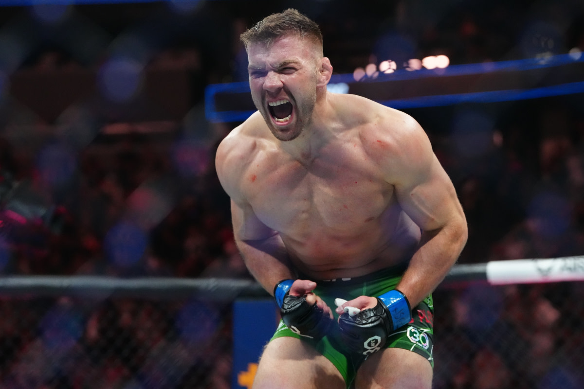 Dricus du Plessis celebrates his second-round TKO victory over Robert Whittaker at UFC 290.