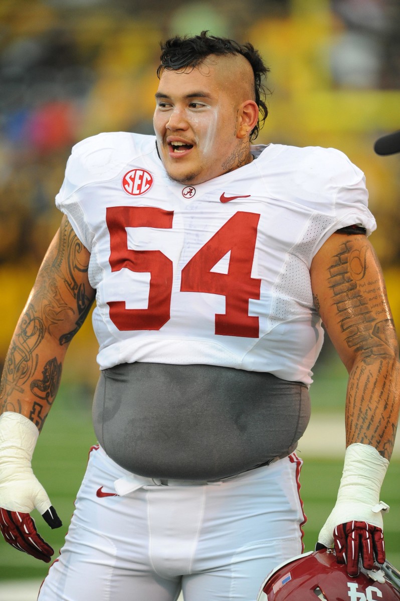 Alabama Crimson Tide defensive lineman Jesse Williams (54) warms up before the game against the Missouri Tigers at Farout Field. The Crimson Tide won 42-10.