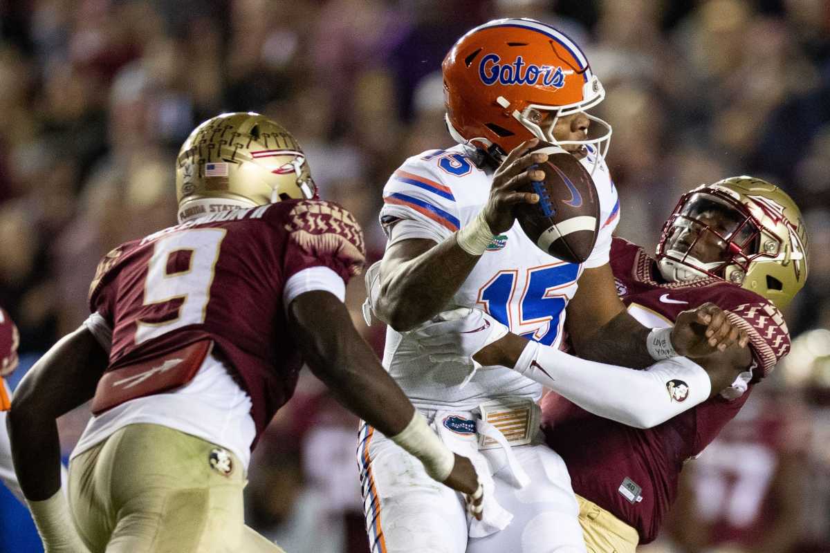 Florida Gators quarterback Anthony Richardson (15) gets sacked by the Florida State Seminoles defense. The Florida State Seminoles defeated the Florida Gators 45-38 at Doak Campbell Stadium on Friday, Nov. 25, 2022