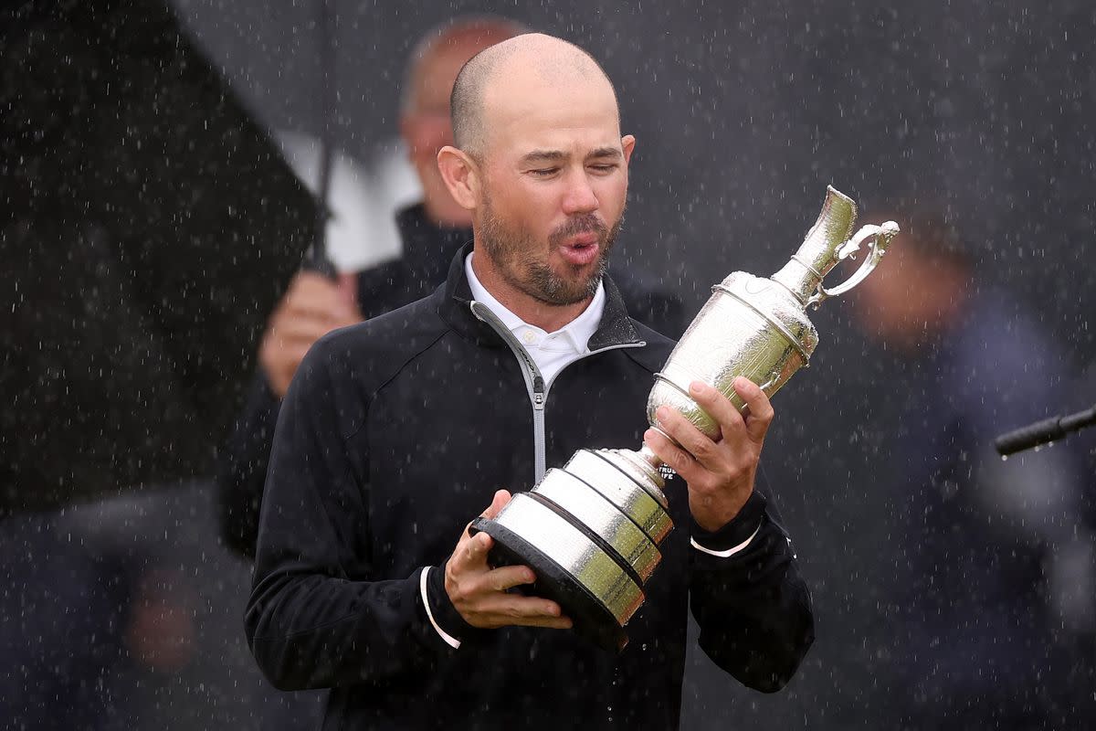 Brian Harman holds the Claret Jug after winning the 2023 British Open by 6-strokes.