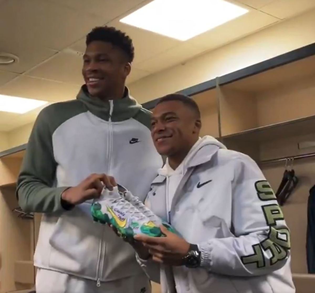 Kylian Mbappe pictured (right) posing for a photo with Giannis Antetokounmpo in January 2020