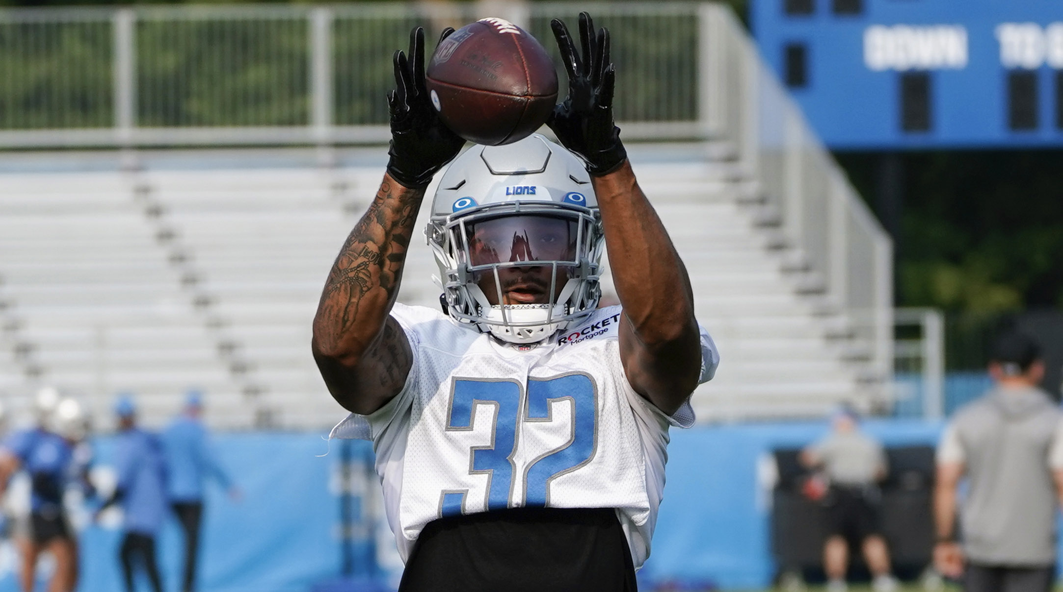 Brian Branch catches a pass during Lions training camp.