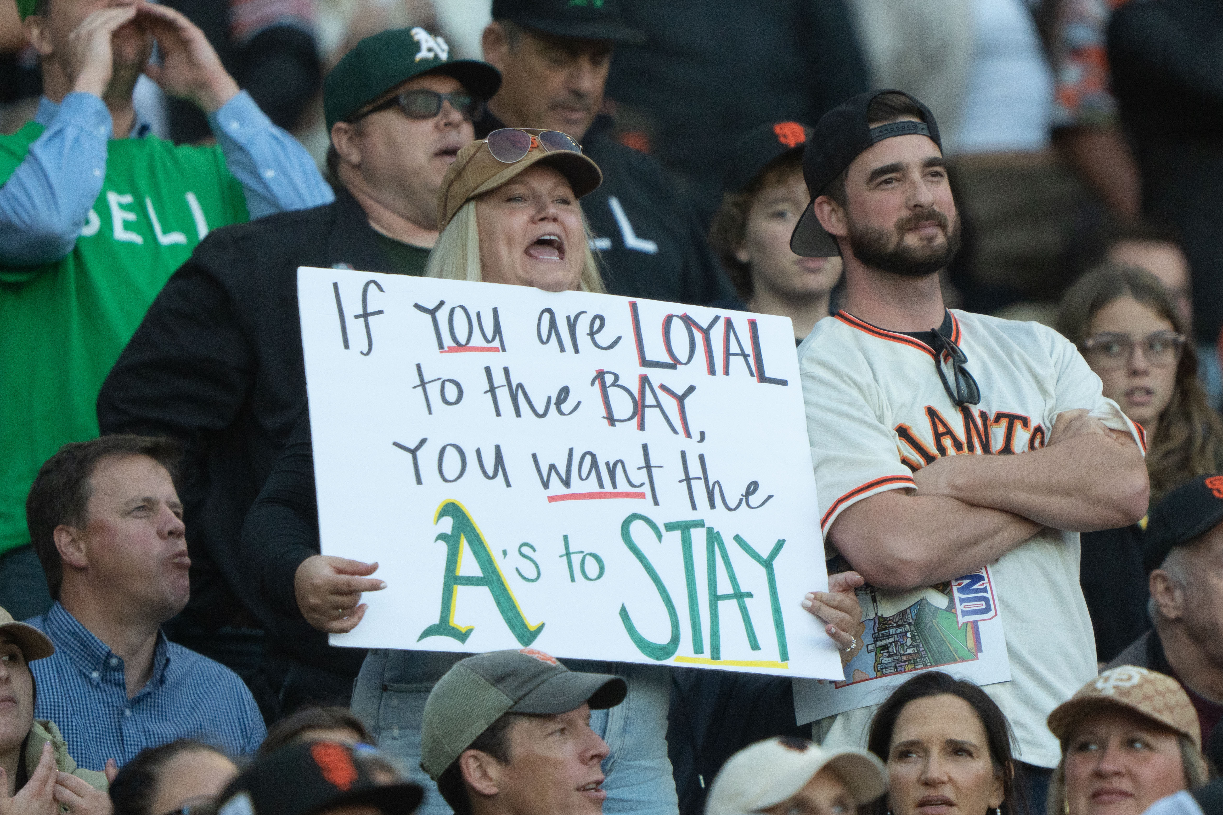 Bay Bridge Series: A's fans get Giants fans to join 'sell the team' protest