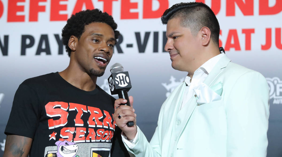 Errol Spence Jr. talks with a promoter ahead of July 2023 bout against Terence Crawford