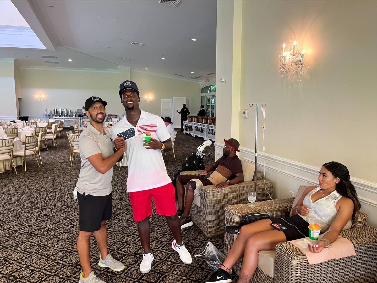 Founder of Everest Wellness Pai Dayan, and Buffalo Bills Cornerback Kaiir Elam getting IV Treatments from Everest.