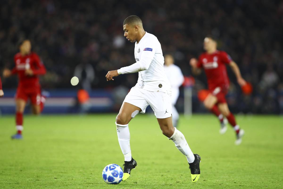 Kylian Mbappe pictured playing for PSG against Liverpool during a UEFA Champions League game in 2018