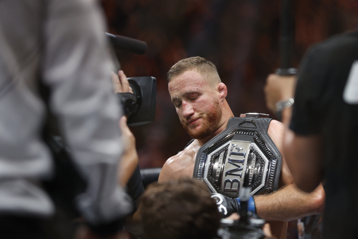 Justin Gaethje holds his BMF Championship after knocking Dustin Poirier out at UFC 291.