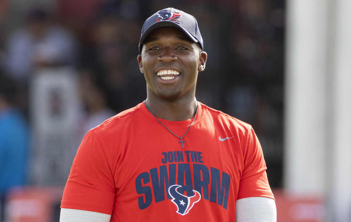 Houston Texans head coach DeMeco Ryans watches players warm up during a 2023 training camp practice at the Houston Methodist Training Center.