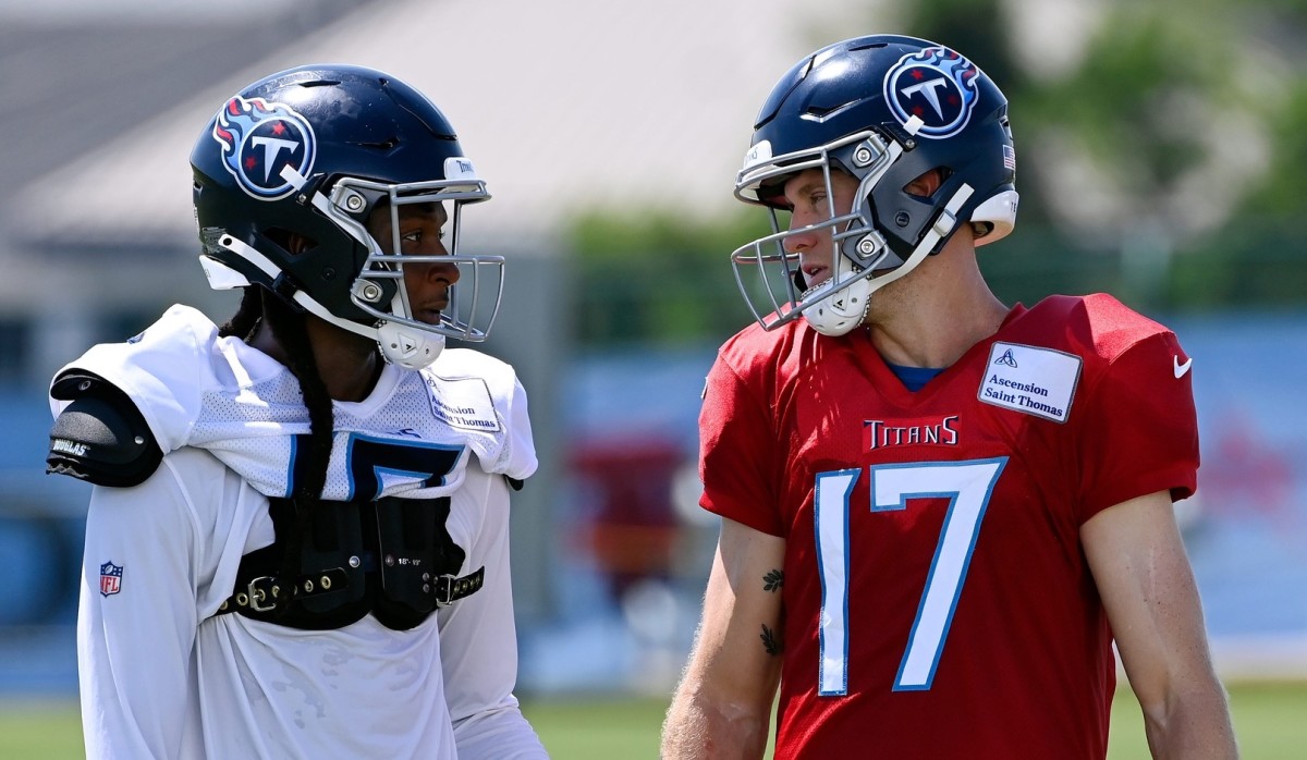 New Tennessee Titans wide receiver DeAndre Hopkins (left) chats with quarterback Ryan Tannehill during training camp practice last week. (Mike Zaleski/USA TODAY Sports)