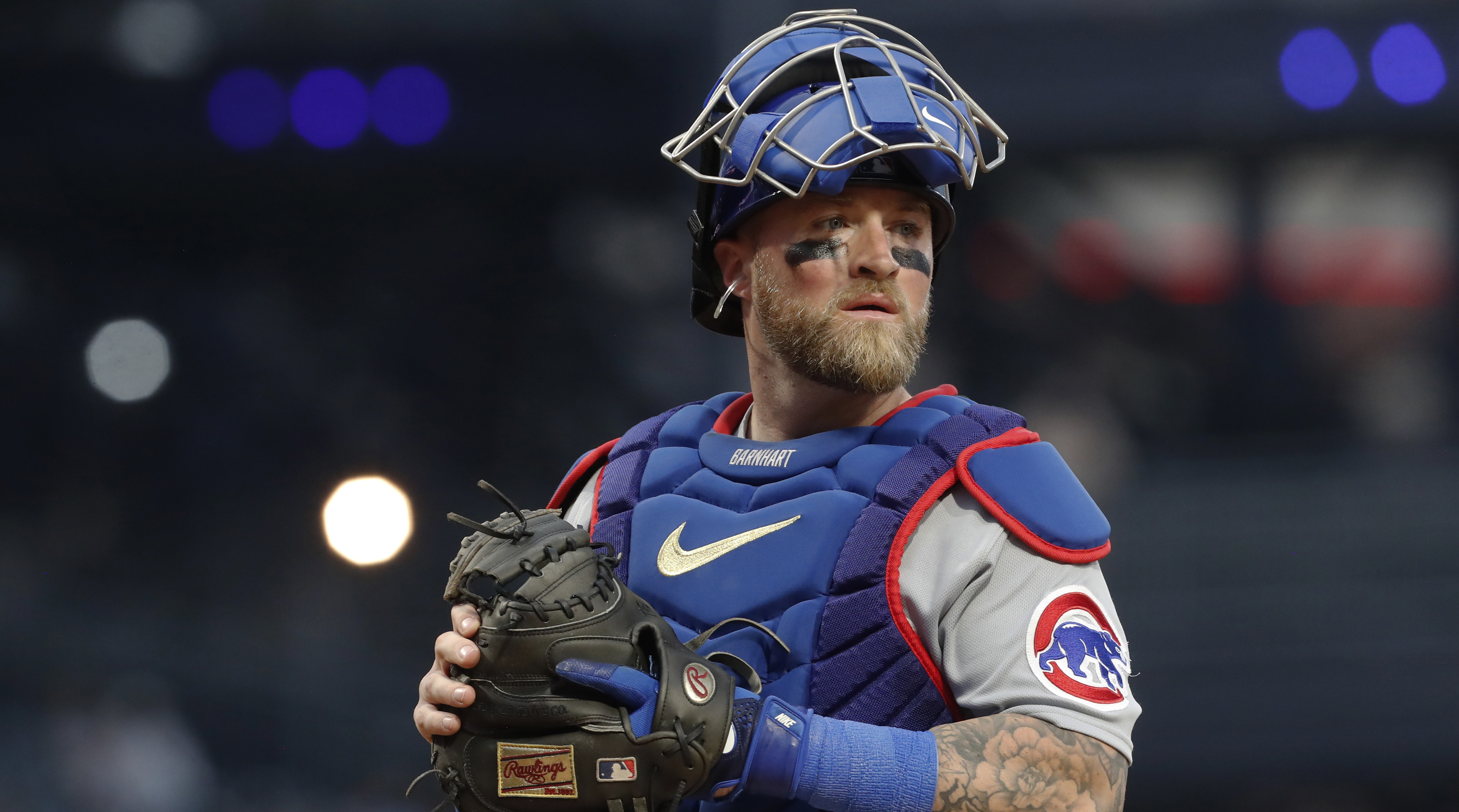 Chicago Cubs catcher Tucker Barnhart (18) laughs after walking off the  mound after he pitched against the New York Mets during the eighth inning  of a baseball game, Monday, Aug.7, 2023, in
