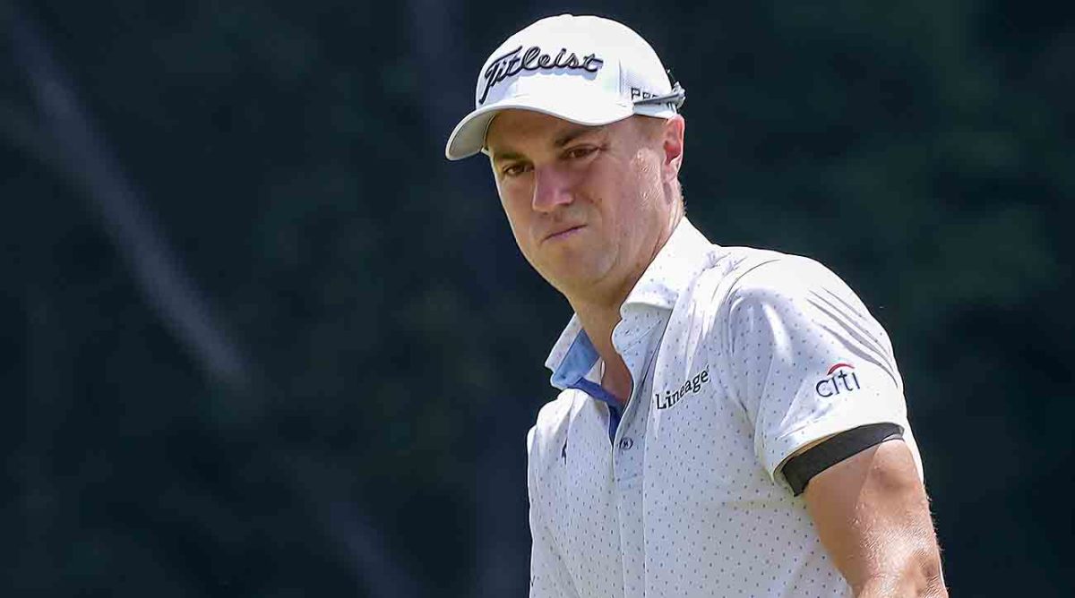 Justin Thomas reacts to a putt on the 9th green during the third round of the 2023 Wyndham Championship.