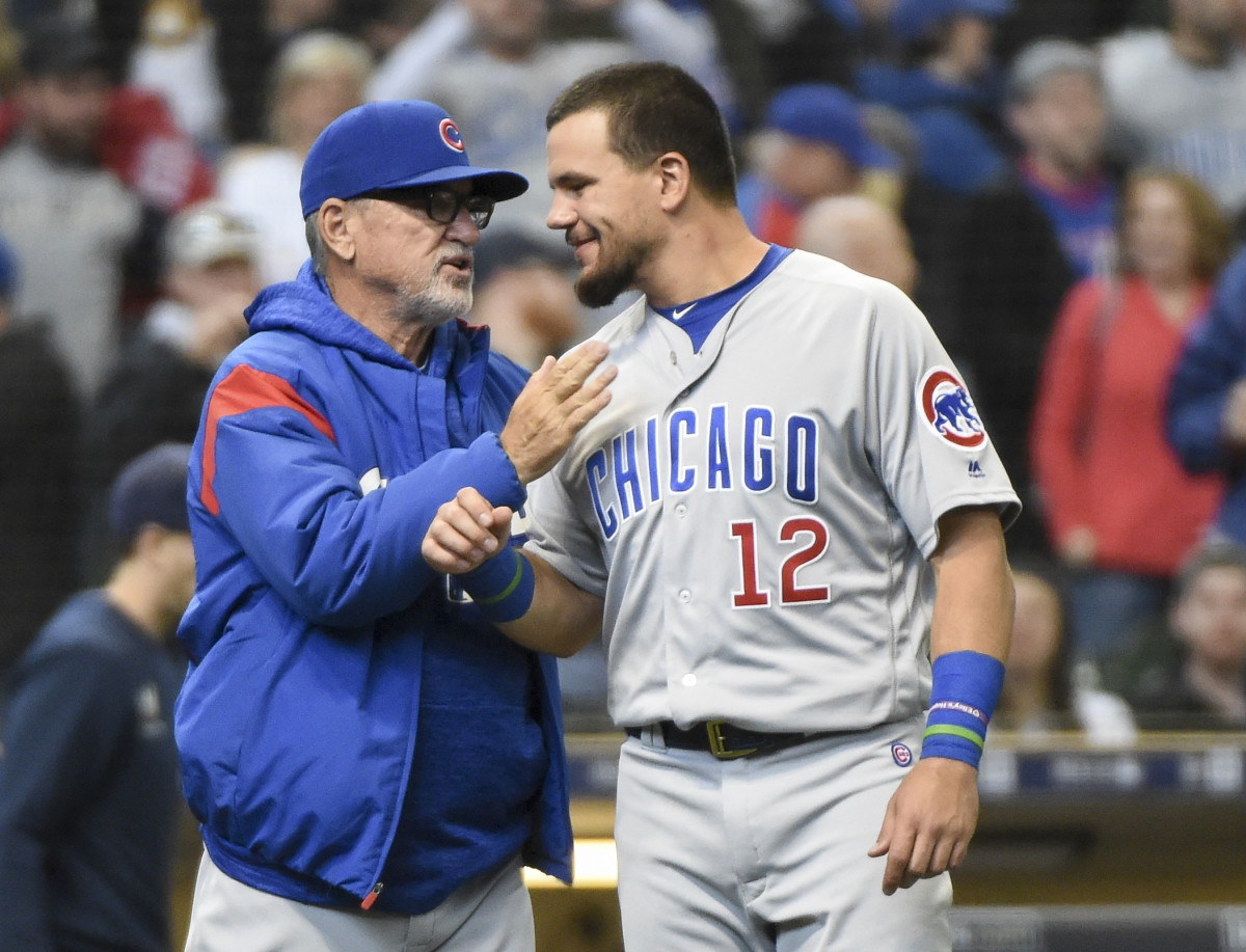 Joe Maddon with Kyle Schwarber