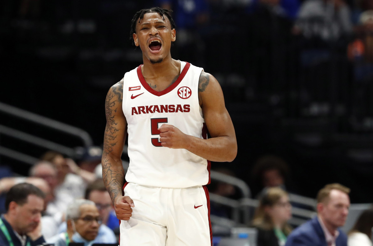 Arkansas Razorbacks guard Au'Diese Toney (5) reacts and celebrates against the LSU Tigers during the first half at Amalie Arena.