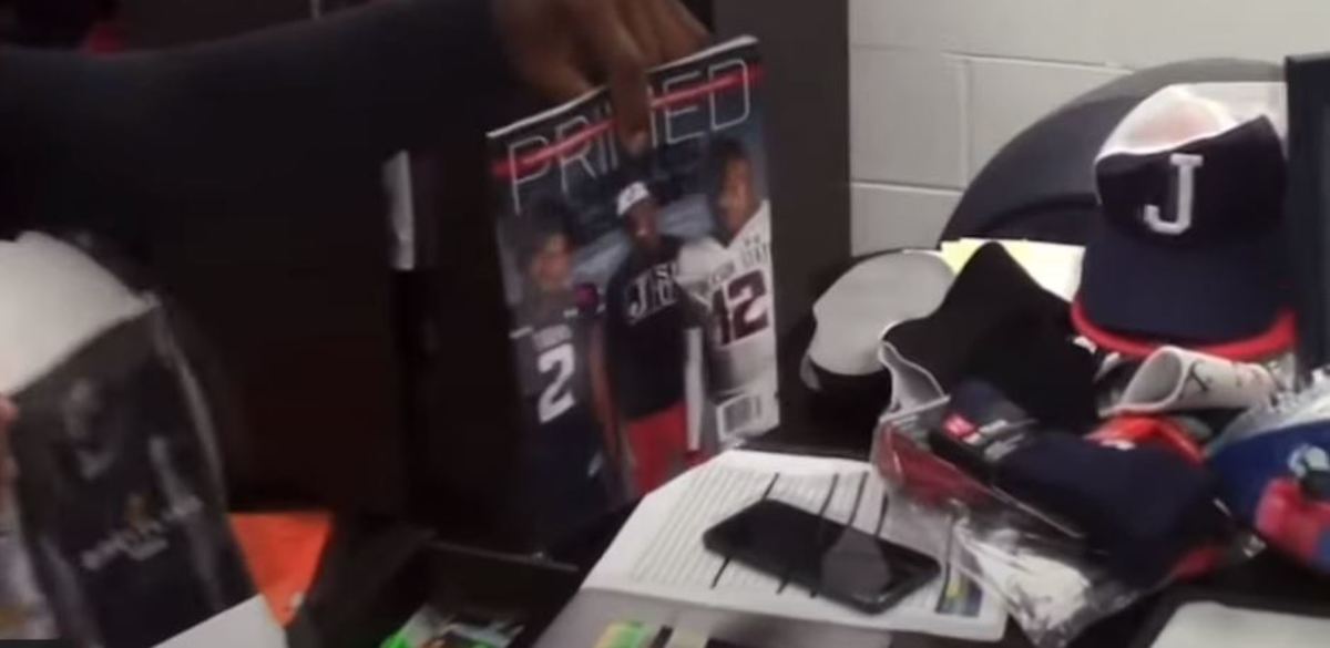 Coach Prime reveals Sports Illustrated cover to his players