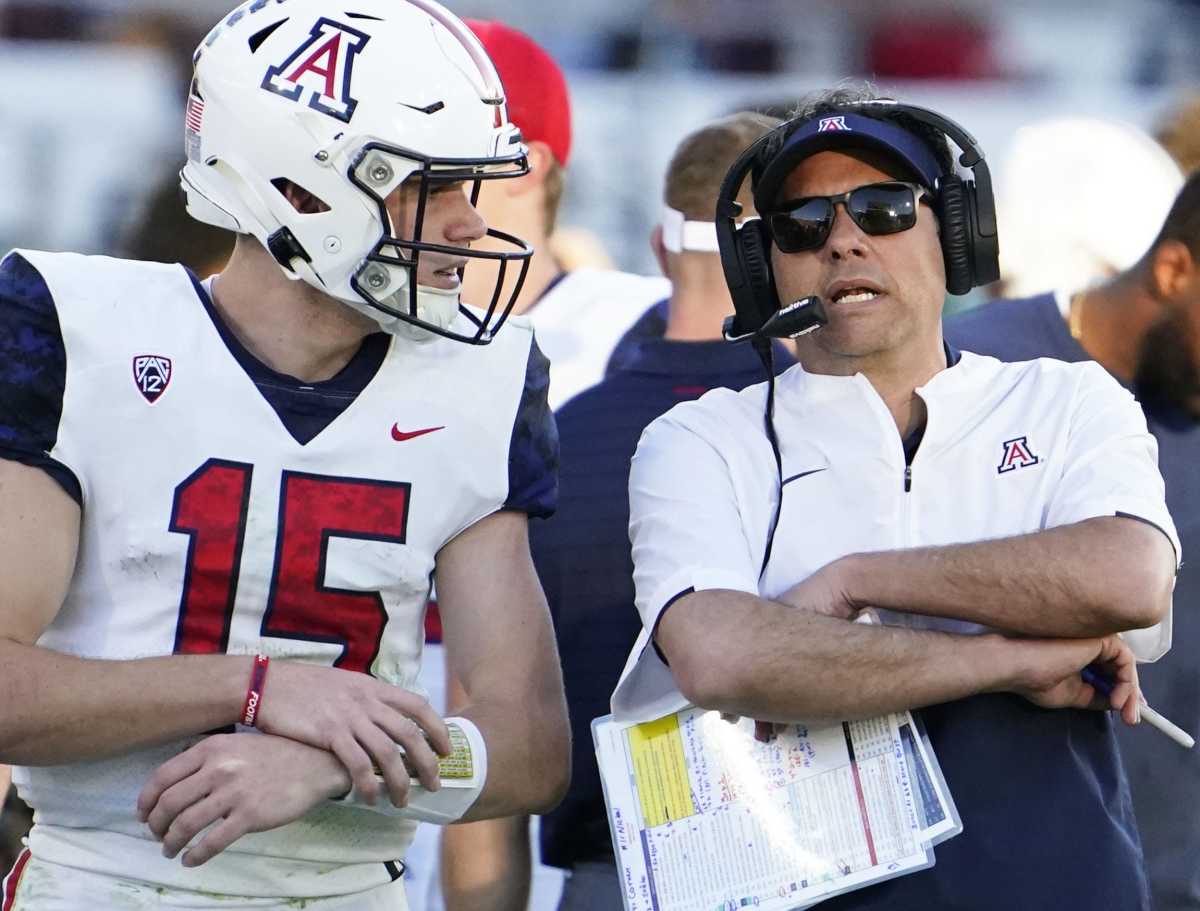 Arizona Wildcats quarterback Will Plummer (15) talks to head coach Jedd Fisch during action against the Arizona State Sun Devils during the 95th Territorial Cup game at Sun Devil Stadium. Mandatory Credit: Rob Schumacher-Arizona Republic Ncaa Football Arizona Wildcats At Arizona State Sun Devils