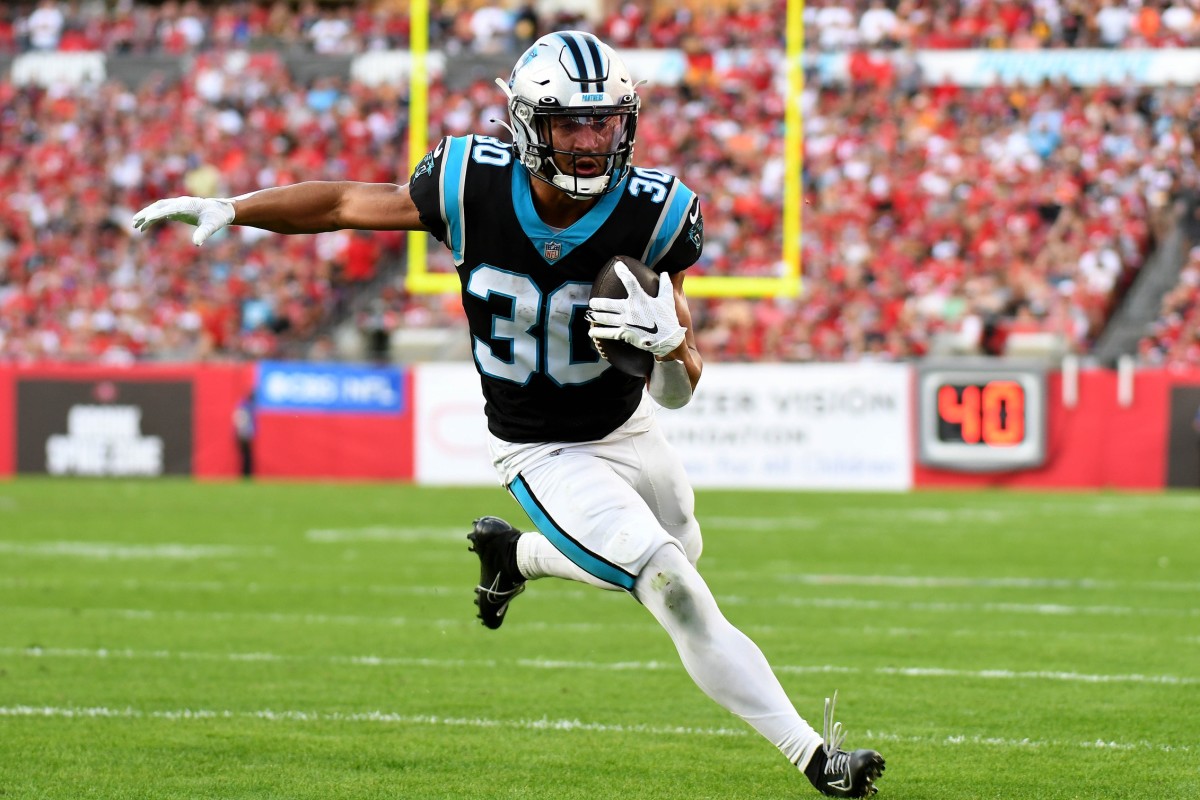 Carolina Panthers running back Chuba Hubbard (30) warms up before an NFL  football game against the Arizona Cardinals on Sunday, Oct. 2, 2022, in  Charlotte, N.C. (AP Photo/Jacob Kupferman Stock Photo - Alamy