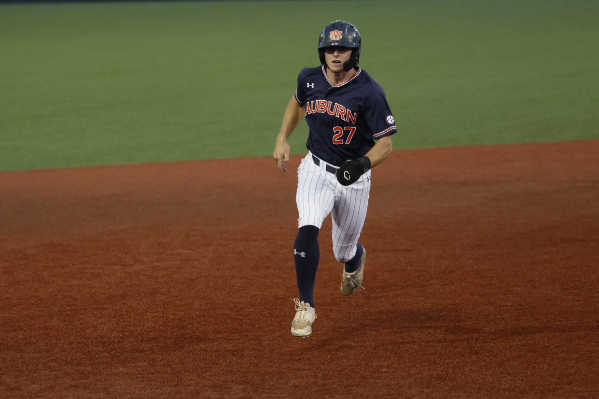 Jun 12, 2022; Corvallis, OR, USA; Auburn Tigers outfielder Bobby Peirce (27) runs toward third base iin the 6th inning against the Oregon State Beavers during Game 2 of a NCAA Super Regional game at Coleman Field.