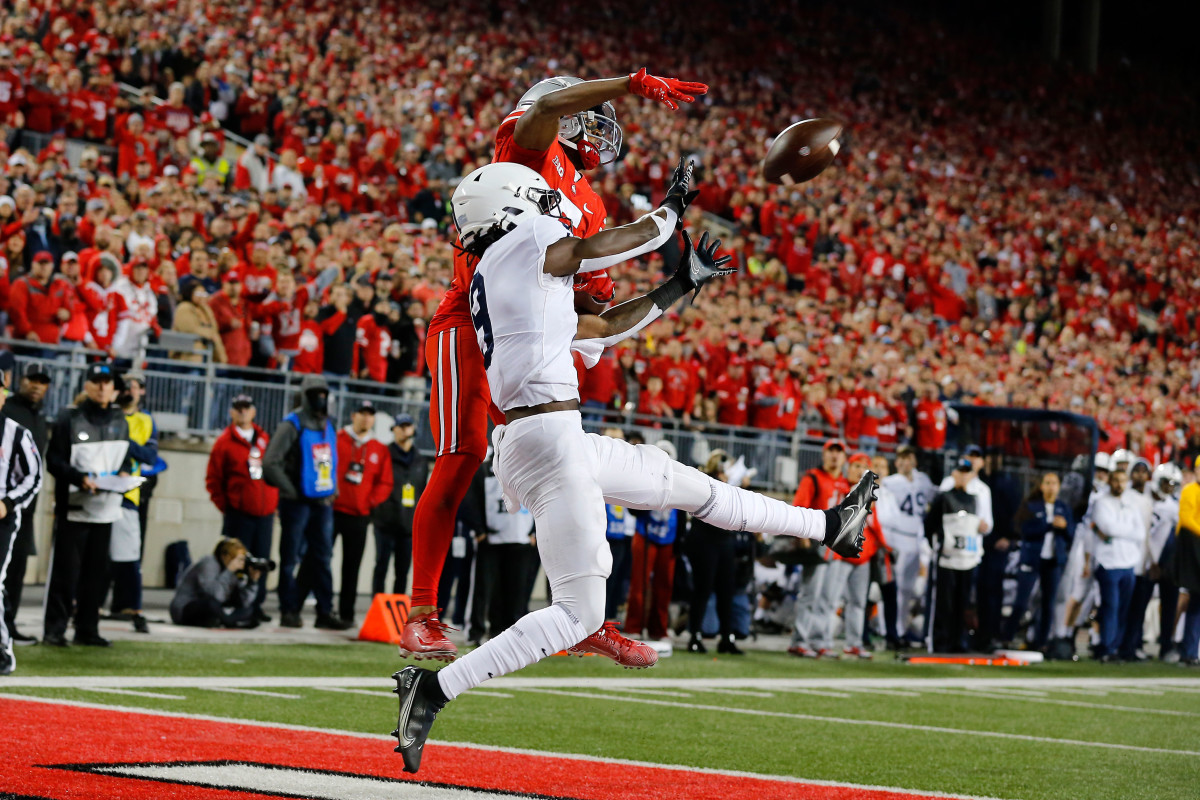 Oct 30, 2021; Columbus, Ohio, USA; Penn State Nittany Lions cornerback Joey Porter Jr. (9) breaks up the pass intended for Ohio State Buckeyes wide receiver Garrett Wilson (5) during the third quarter at Ohio Stadium. Mandatory Credit: Joseph Maiorana-USA TODAY Sports