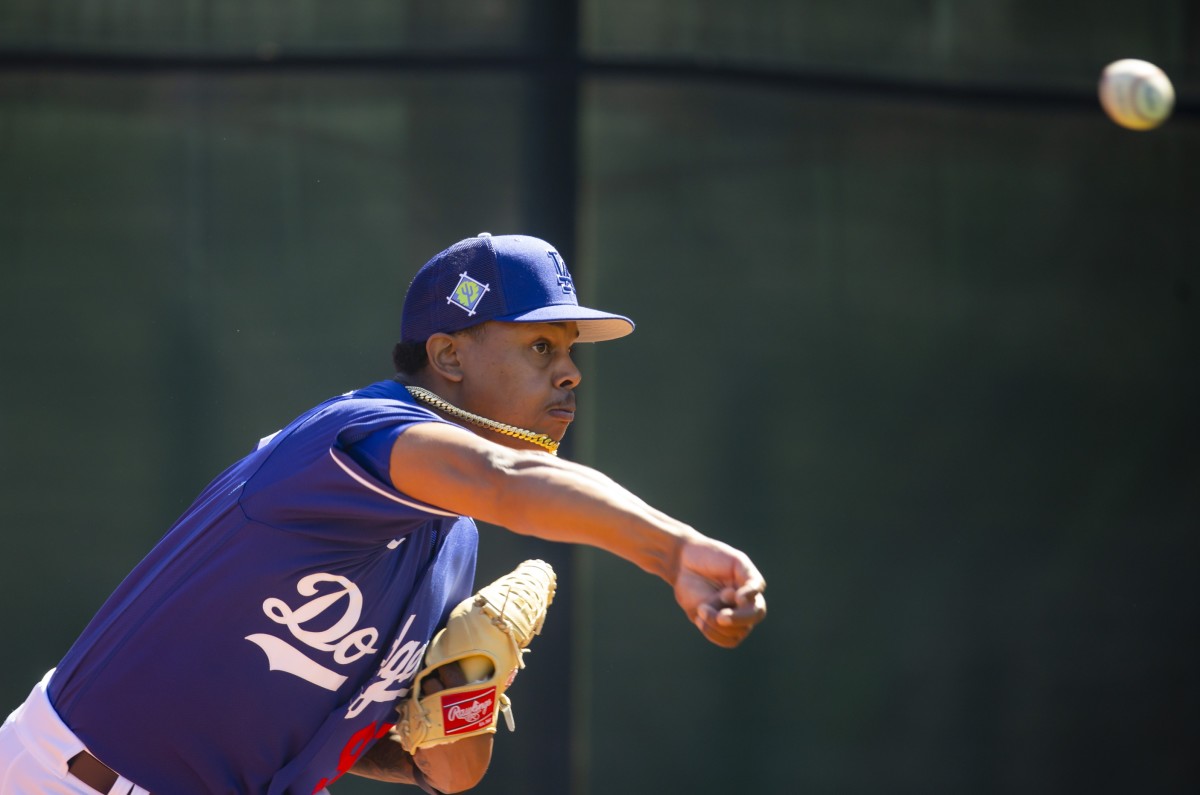 Los Angeles Dodgers relief pitcher Yency Almonte hugs Los Angeles News  Photo - Getty Images