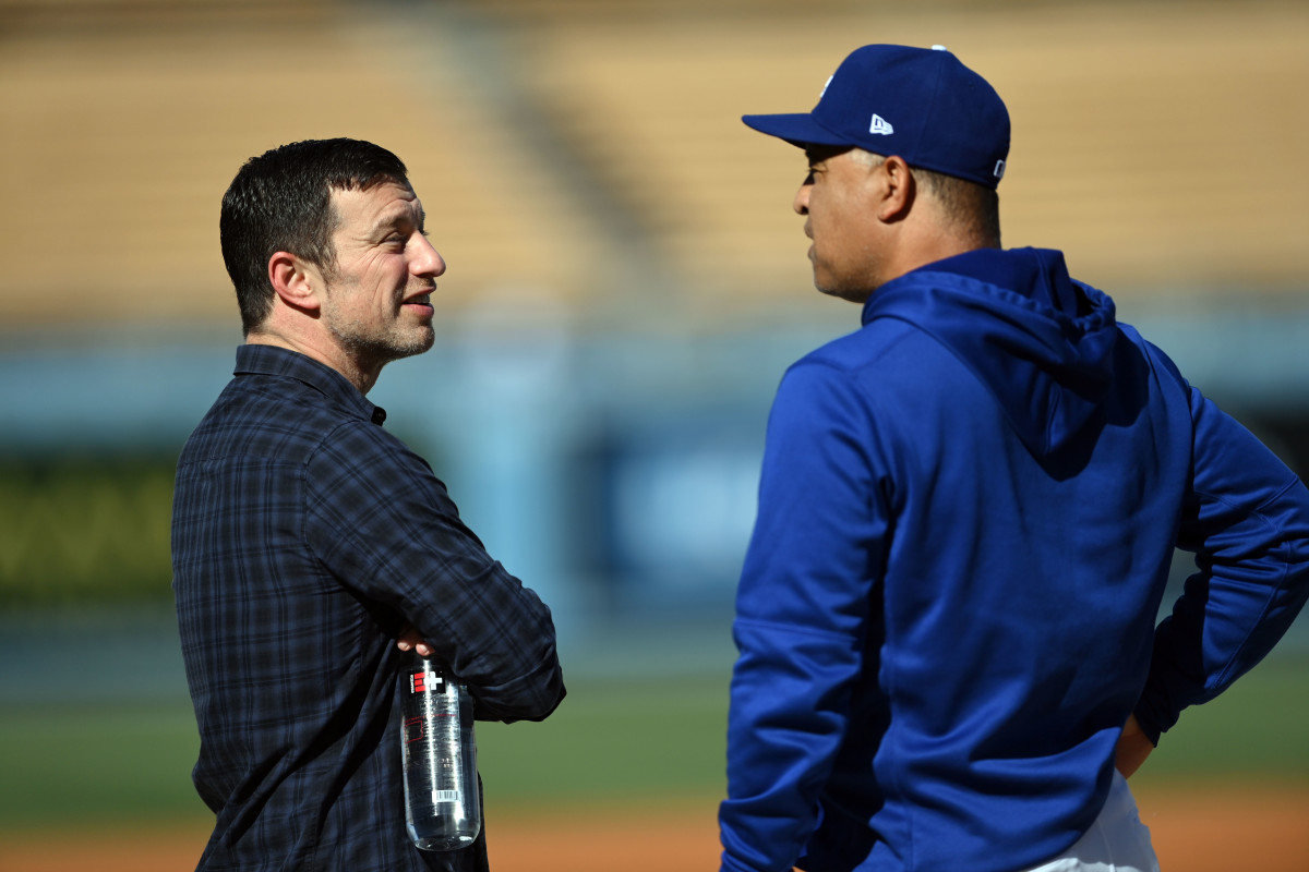 Dodgers' Andrew Friedman and Dave Roberts pitch in for front-line