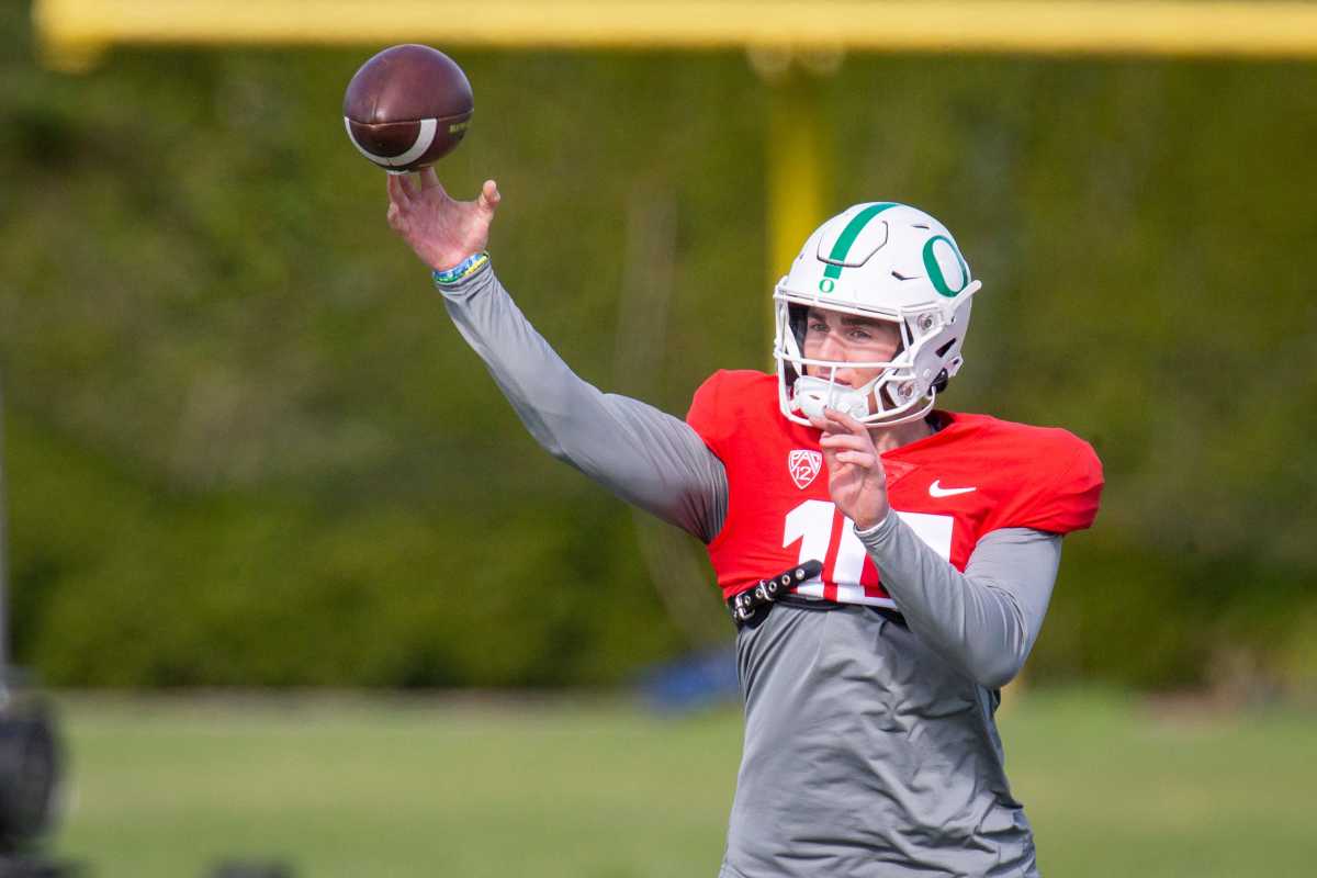 Oregon quarterback Bo Nix (10) works out with the Ducks during practice on Thursday, April 21, 2022, in Eugene.