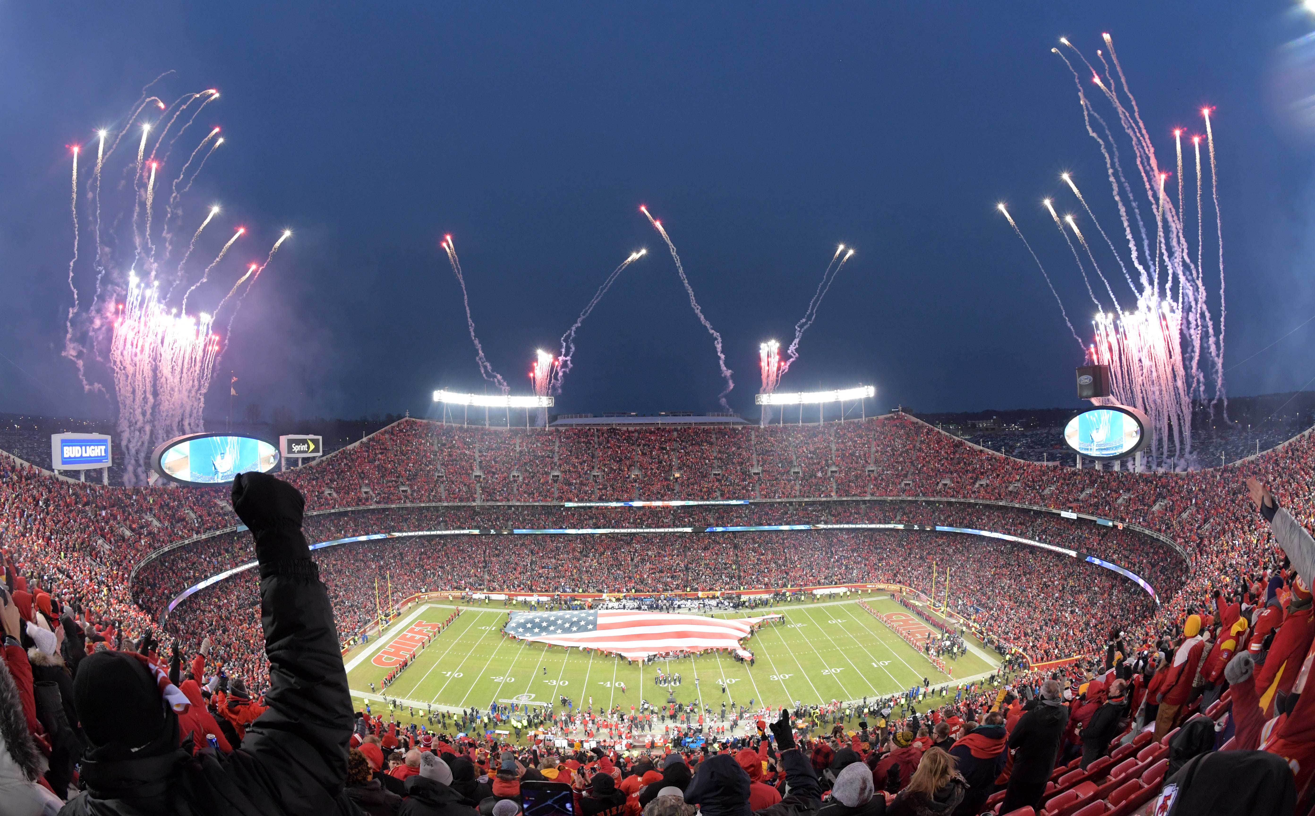 Fireworks stream above Arrowhead Stadium before an NFL football