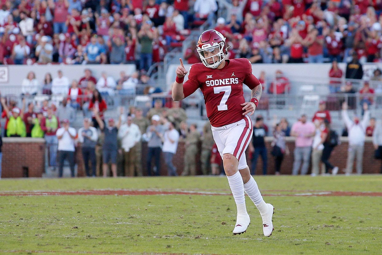 Oklahoma QB Spencer Rattler runs after throwing touchdown