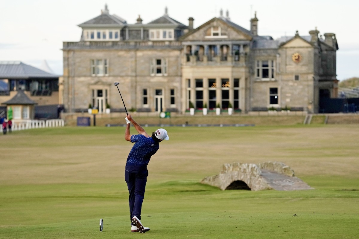 Max Homa watches his tee shot on the 18th hole at St. Andrews