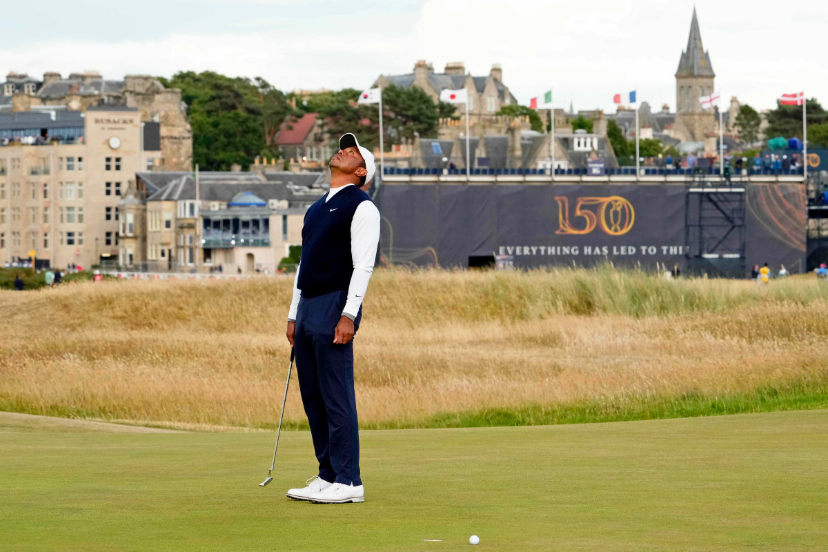 Tiger Woods reacts after a putt on the 16th green during the first round of the 150th Open Championship golf tournament at St. Andrews Old Course.