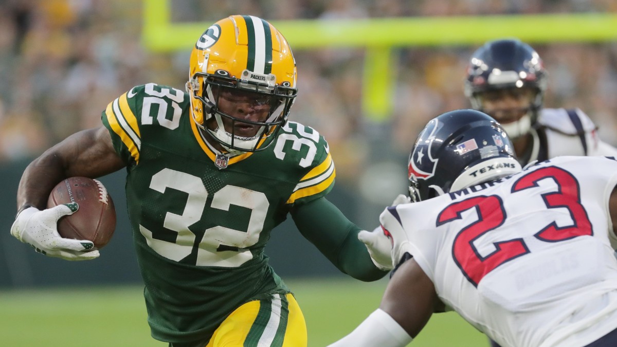 GREEN BAY, WI - AUGUST 14: Green Bay Packers long snapper Hunter Bradley  (43) leads the team downfield during a game between the Green Bay Packers  and the Houston Texans at Lambeau