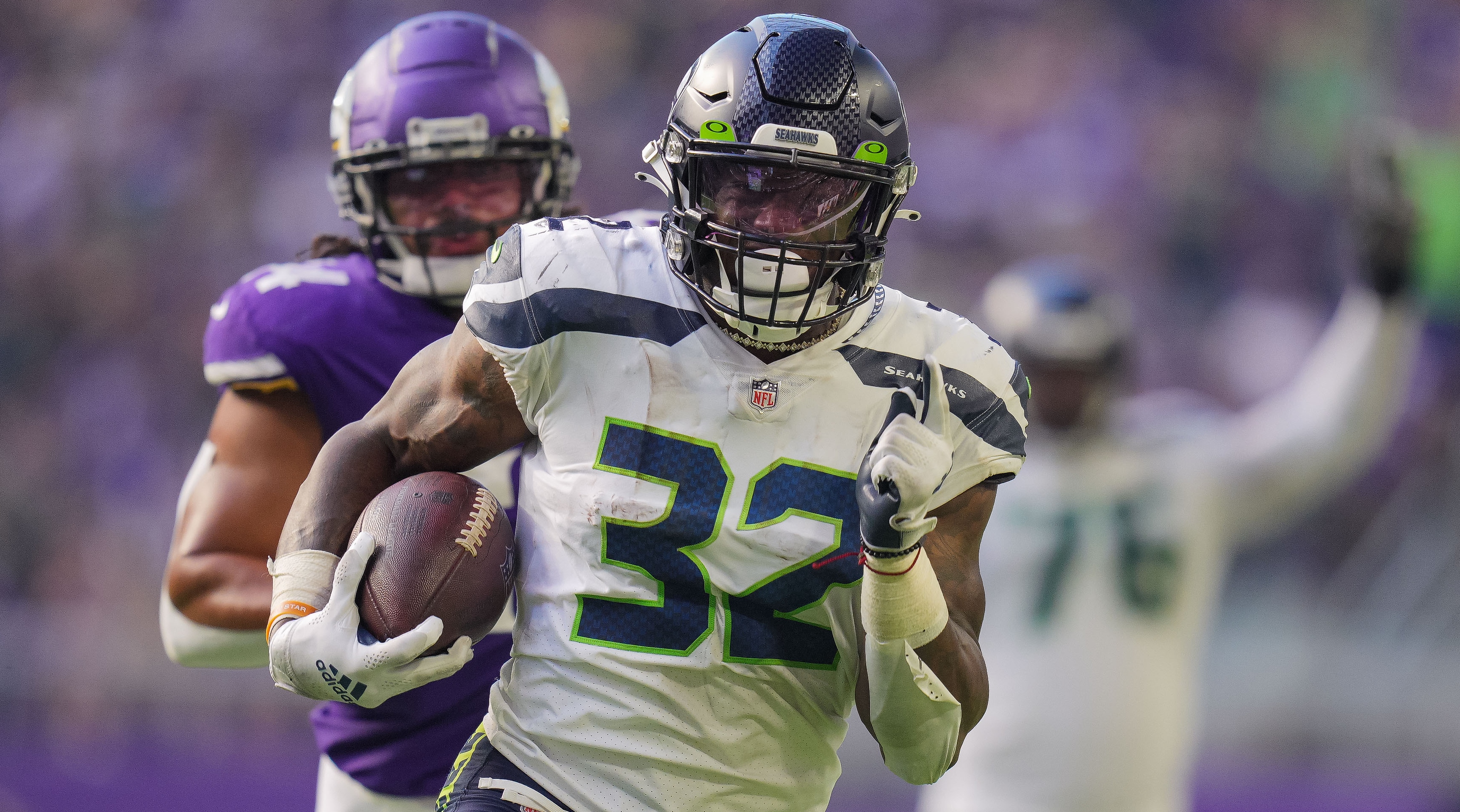 Seattle Seahawks running back Chris Carson (32) rushes at Cleveland Browns  defensive back T.J. Carrie (38) during an NFL football game in Cleveland,  Sunday, Oct. 13, 2019,(AP Photo/Rick Osentoski Stock Photo - Alamy