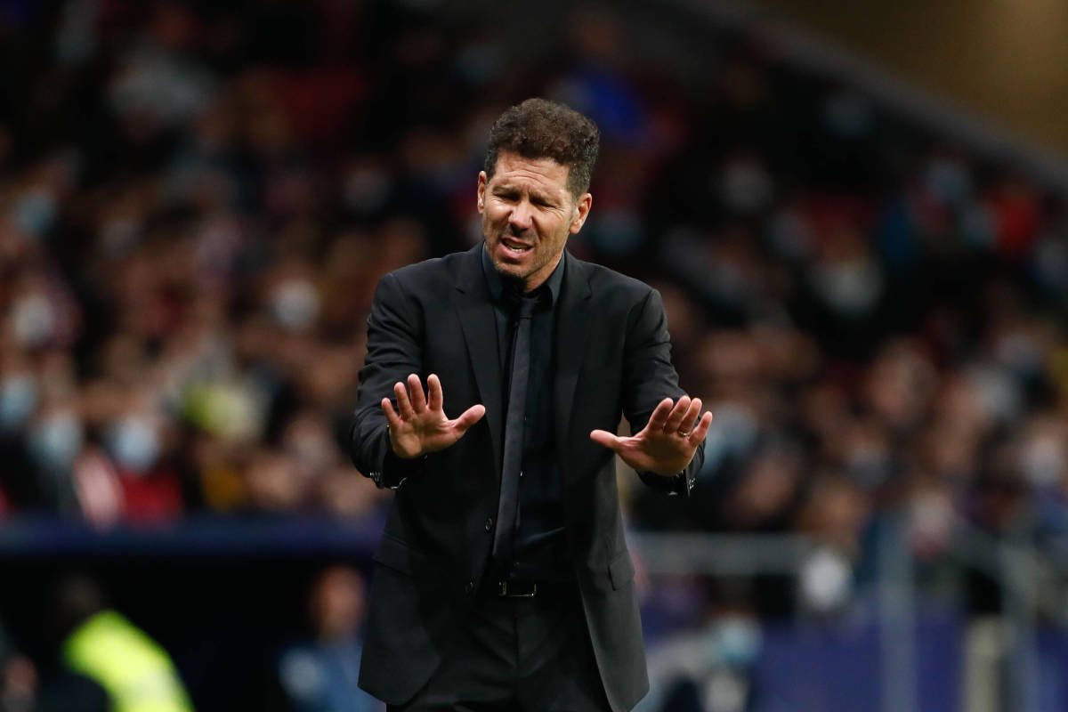 Diego Simeone looks frustrated as he watches Atletico Madrid lose at home to Levante in February 2022