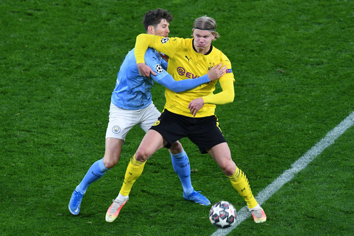 Erling Haaland (right) pictured in action for Borussia Dortmund against Manchester City in April 2021