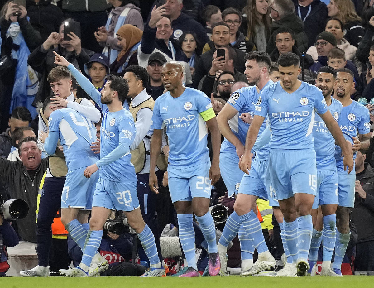 Manchester City's players celebrate during their 4-3 win over Real Madrid in their Champions League semi-final first leg