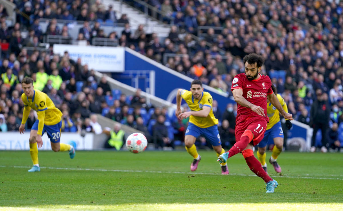 Mo Salah scores his 115th Premier League goal for Liverpool with a penalty kick at Brighton