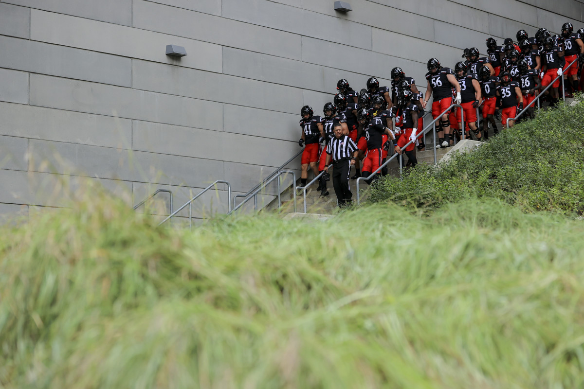 Sep 4, 2021; Cincinnati, Ohio, USA; The Cincinnati Bearcats walk the steps from the locker room prior to the game against the Miami (Oh) Redhawks at Nippert Stadium. Mandatory Credit: Aaron Doster-USA TODAY Sports