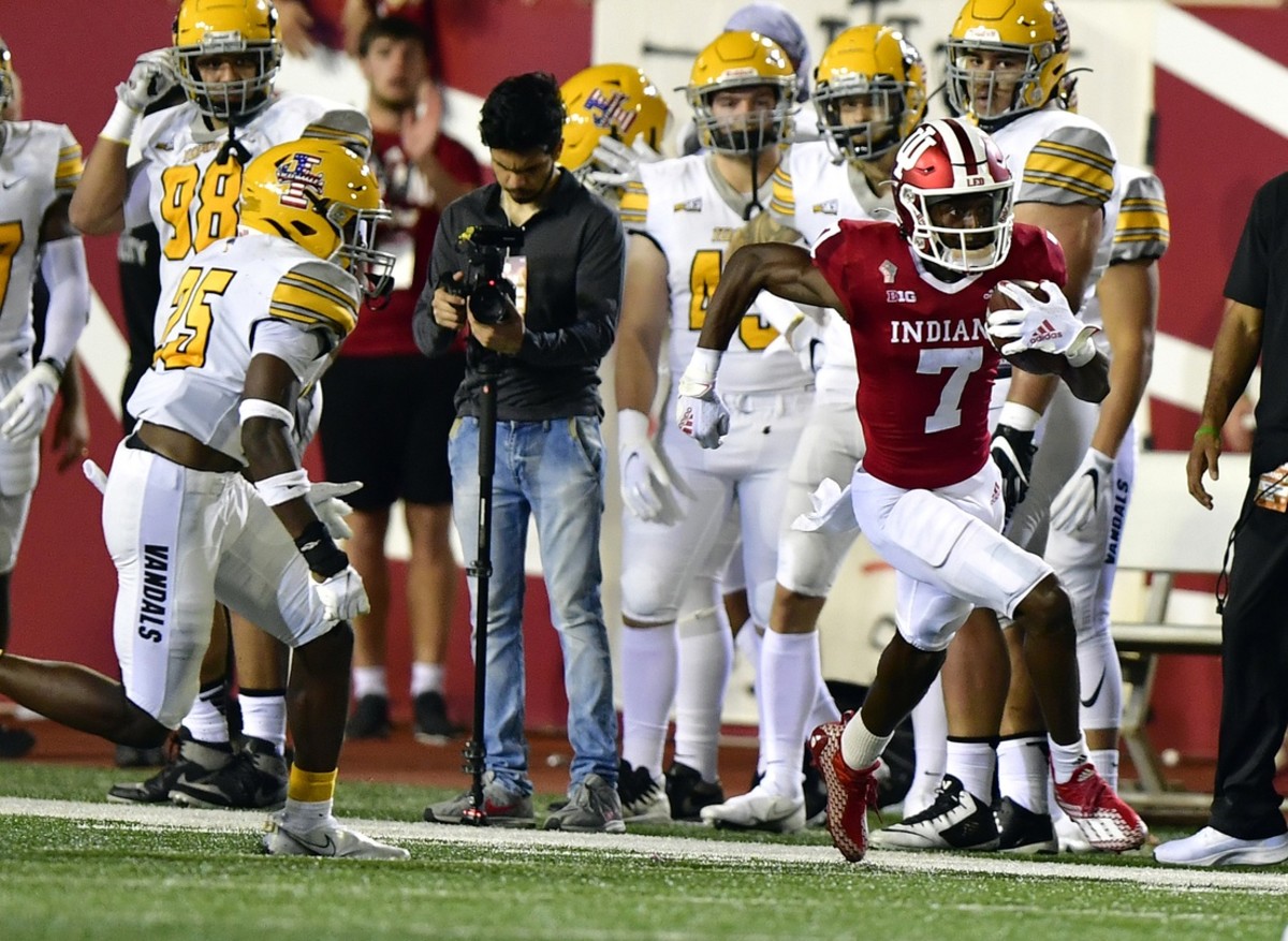 Indiana wide receiver D.J. Matthews Jr. (7) runs the ball to the end zone on a kickoff against the Idaho Vandals during the second quarter at Memorial Stadium