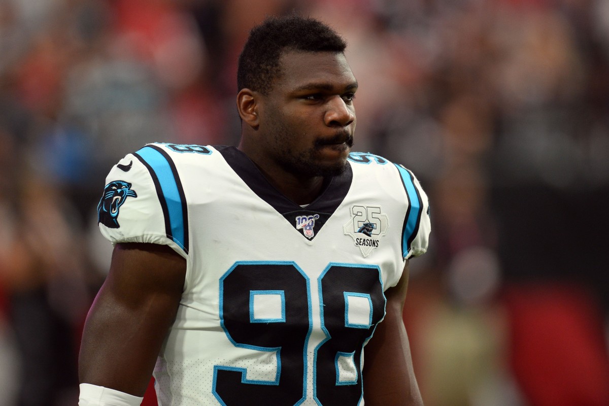 Carolina Panthers defensive end Marquis Haynes (98) and New England Patriots  defensive back A.J. Moore (33) during the preseason NFL football game  between the New England Patriots and the Carolina Panthers on