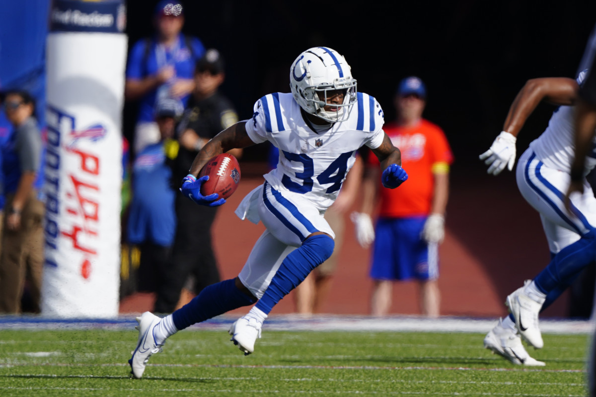 Aug 13, 2022; Orchard Park, New York, USA; Indianapolis Colts cornerback Isaiah Rodgers (34) returns a kick against the Buffalo Bills during the first half at Highmark Stadium. Mandatory Credit: Gregory Fisher-USA TODAY Sports