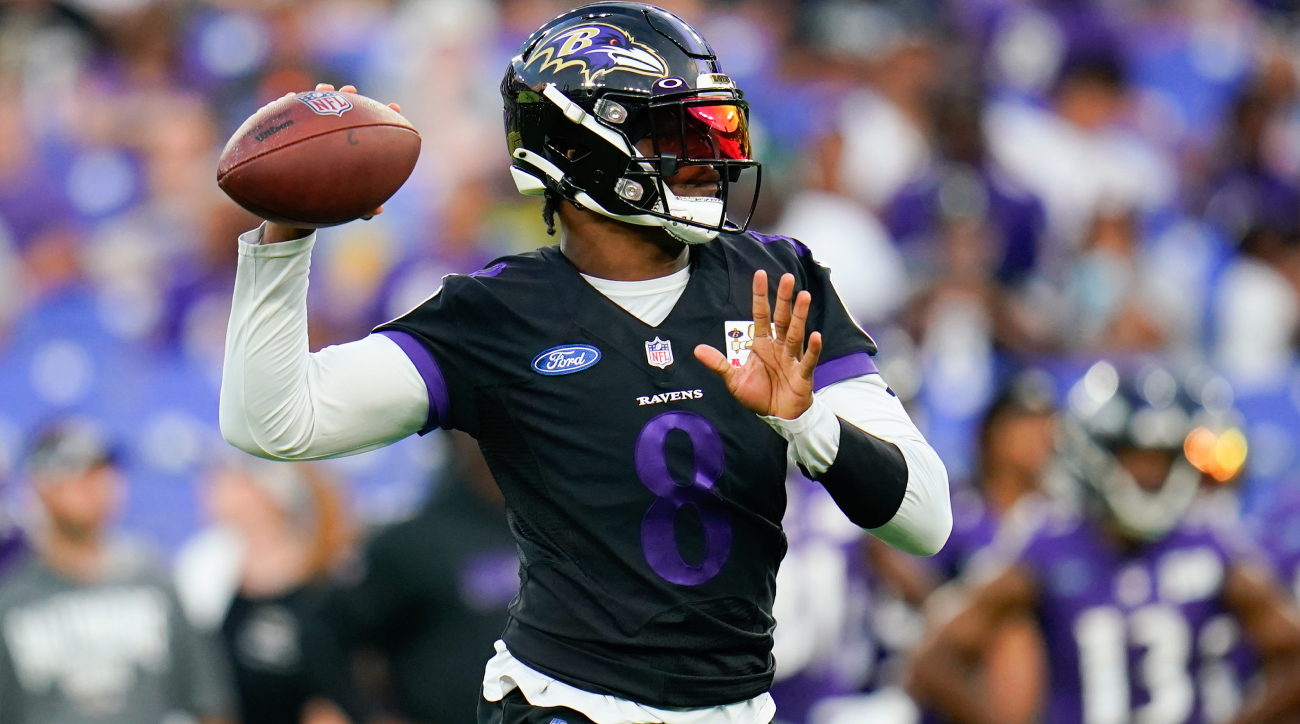 Young Ravens Fan Had Priceless Reaction to High-Fiving Lamar